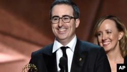John Oliver and the crew of “Last Week Tonight with John Oliver” accept the award for outstanding variety talk series at the 68th Emmy Awards, Sept. 18, 2016, in Los Angeles.