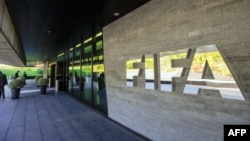 FILE - FIFA (International Football Federation Association) outside the organization's headquarters in Zurich.