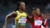 Veronica Campbell-Brown người Jamaica (trái) về nhất vòng bán kết cuộc đua 200 mét nữ tại Olympic London 2012, 7/8/2012