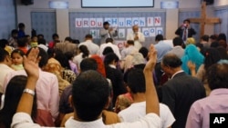 In this Jan. 18, 2015, photo, Pakistani refugees and asylum-seekers who fled persecution in their homeland worship at an Urdu-speaking church on the outskirts of Bangkok, Thailand. Human-rights groups say Pakistan’s religious minorities are increasingly persecuted, not only by Christians but Hindus and Ahmadis, an Islamic sect rejected by mainstream Muslims. (AP Photo/Malcolm Foster)