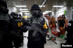 South Korean policemen take part in an anti-terror drill as part of the Ulchi Freedom Guardian exercise in Seoul, South Korea, Aug. 22, 2017.