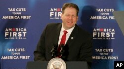 FILE - New Hampshire Governor Chris Sununu speaks in Manchester, N.H., March 22, 2018.