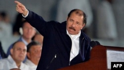 Nicaraguan President Daniel Ortega addresses a massive rally, Nov. 29, 2016, on Revolution Square in Havana in honor of the late Cuban leader Fidel Castro. 