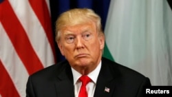 U.S. President Donald Trump looks up during his meeting with Palestinian President Mahmoud Abbas during the U.N. General Assembly in New York, Sept. 20, 2017.