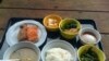 Japanese breakfast may include rice, noodles, fish and miso soup.
