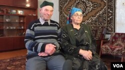 Azime (R) and Rustem Umerov were children when Stalin's security forces deported them from Crimea in 1944. To them, Mocow's annexation of the peninsula has been another chapter in a long history of Russian persecution of the Tatar people. (L. Ramirez/VOA)