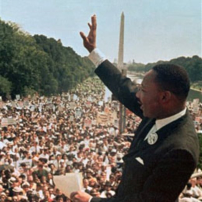 Dr. Martin Luther King Jr. waves to the crowd at the Lincoln Memorial for his "I Have a Dream" speech on August 28, 1963