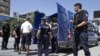 ARHIVA - Kosovska policija sprovodi u sud Albanca za kojeg se sumnja da se pridružio ekstremistima u Siriji, Priština 12. avgust 2014.