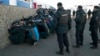 Moscow Police Detain Migrants Following Ethnic Unrest