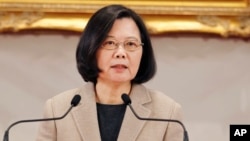 FILE - Taiwanese President Tsai Ing-wen delivers a speech at a New Year's press conference in Taipei, Taiwan, Jan. 1, 2019. Taiwan's official Central News Agency said that March 21- 28, Tsai is embarking on a tour of diplomatic allies in the Pacific, including a stop in Hawaii.