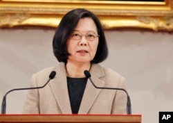 FILE - Taiwanese President Tsai Ing-wen delivers a speech in Taipei, Jan. 1, 2019.