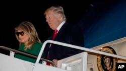 President Trump and first lady Melania Trump arrive at Andrews Air Force Base, Md., Dec. 27, 2018, after traveling to Iraq and Germany.
