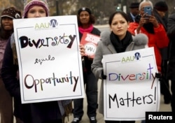 FILE – Demonstrators take part in a rally as the US Supreme Court hears the affirmative action in university admissions case in Washington, Dec. 9, 2015. The partnership behind ‘The Challenge of Diversity’ hopes to inspire game designers and filmmakers to