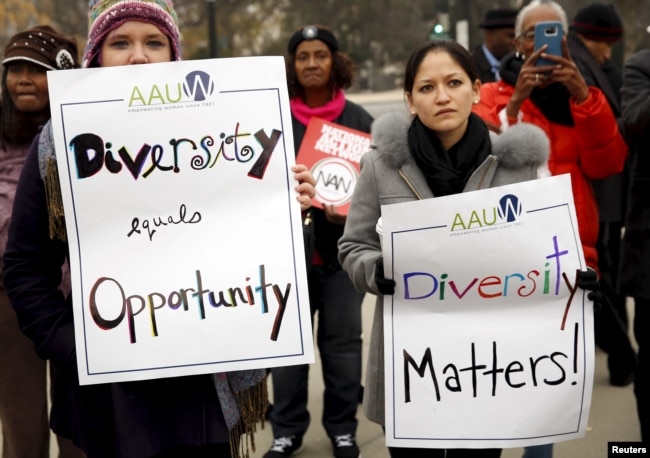 FILE – Demonstrators take part in a rally as the US Supreme Court hears the affirmative action in university admissions case in Washington, Dec. 9, 2015. The partnership behind ‘The Challenge of Diversity’ hopes to inspire game designers and filmmakers to