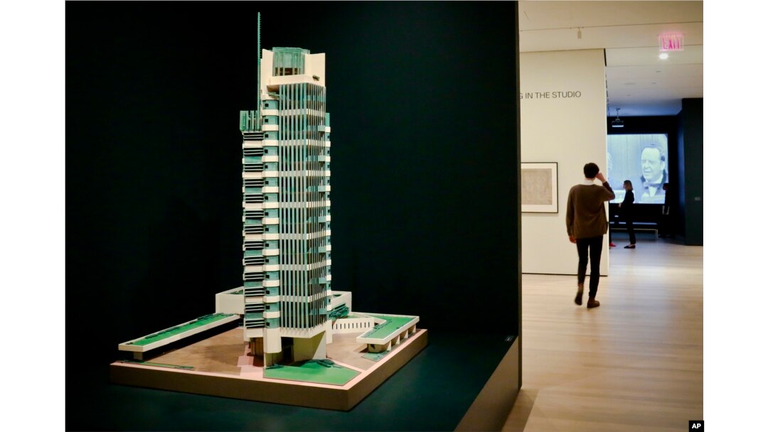 A 1952 model of architect Frank Lloyd Wright's Price Tower hi-rise, which was built in Bartlesville, Okla., is displayed at the press preview for the MOMA exhibition, "Frank Lloyd Wright at 150: Unpacking the Archive," June 8, 2017, in New York.
