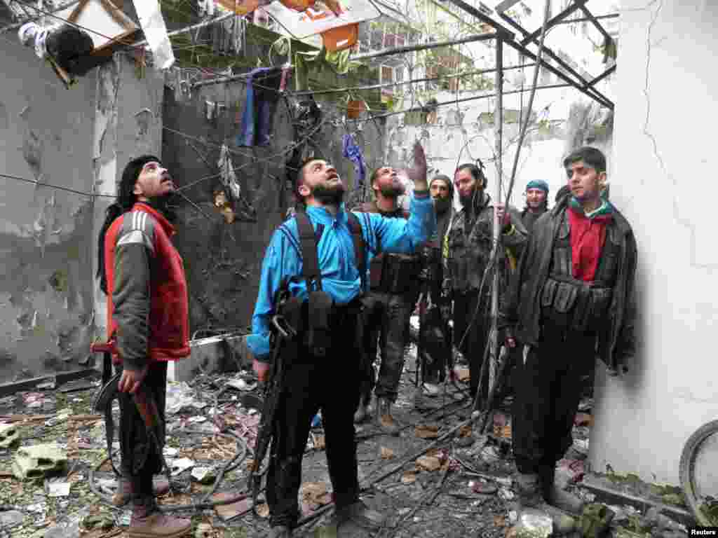 Free Syrian Army fighters in the Al-Khalidiya neighborhood of Homs, March 3, 2013. 