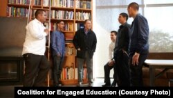 Paul F. Cummins, educator and founder of Coalition for Education, chats with alumni of Coalition for Engaged Education programs.