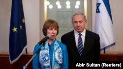 European Union foreign policy chief Catherine Ashton (L) speaks during her meeting with Israel's Prime Minister Benjamin Netanyahu in Jerusalem, June 20, 2013.