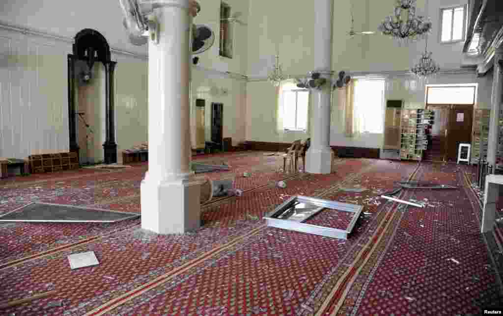 Wreckage in a mosque after a suicide car bomb exploded in the main business district of Damascus, April 8, 2013.