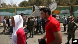 Le site du crash d'un avion près de Téhéran, Iran, le 10 août 2014.
