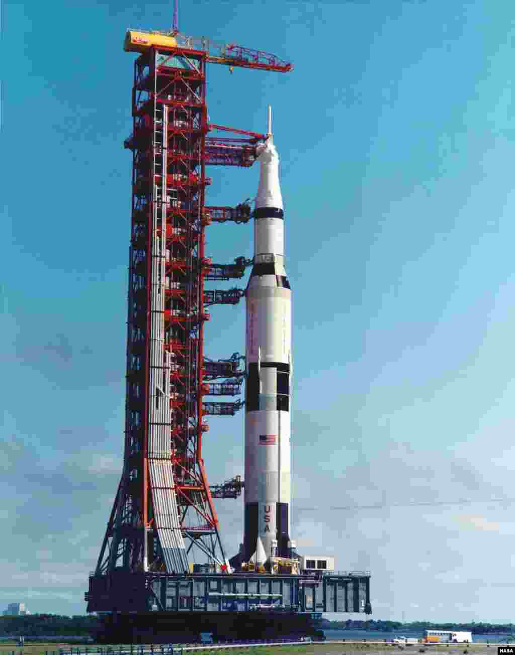 The Apollo 11 Saturn V rocket is being moved to the pad aboard the Mobile Launch Platform (MLP) at Cape Canaveral May, 1969.