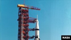 The Apollo 11 Saturn V rocket is being moved to the pad aboard the Mobile Launch Platform (MLP) at Cape Canaveral May, 1969.