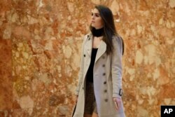 Hope Hicks, press secretary for President-elect Donald Trump's campaign, arrives at Trump Tower, Nov. 14, 2016, in New York.