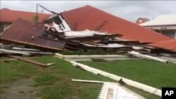 This image made from a video shows the wreckage of the parliament house that was hit by Tropical Cyclone Gita in Nuku’alofa, Tonga, Feb. 13, 2018.