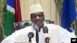 FILE - In this image taken from TV, Gambia's longtime leader Yahya Jammeh appears on state TV to give a brief statement agreeing to step down from office, in Banjul, Gambia, in the early hours of Jan. 21, 2017.