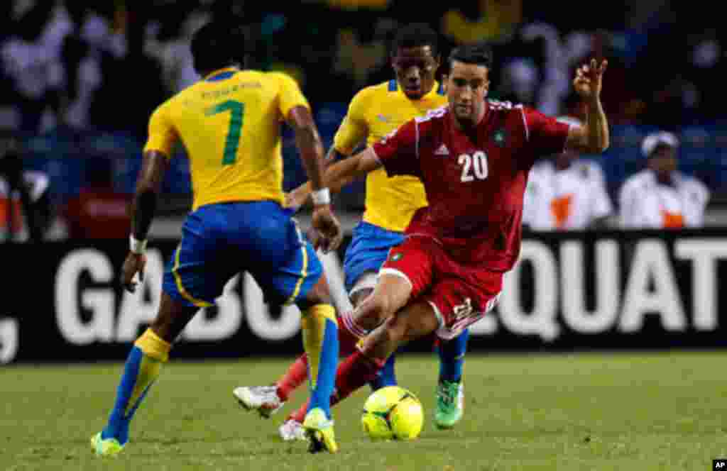 Morocco's Hadji drives the ball against Gabon during their African Cup of Nations soccer match in Libreville
