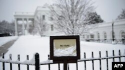Tòa Bạch ốc trong cơn bão tuyết mùa Đông vào ngày thứ 23 chính phủ Mỹ đóng cửa (ảnh chụp ngày 13/1/2019)