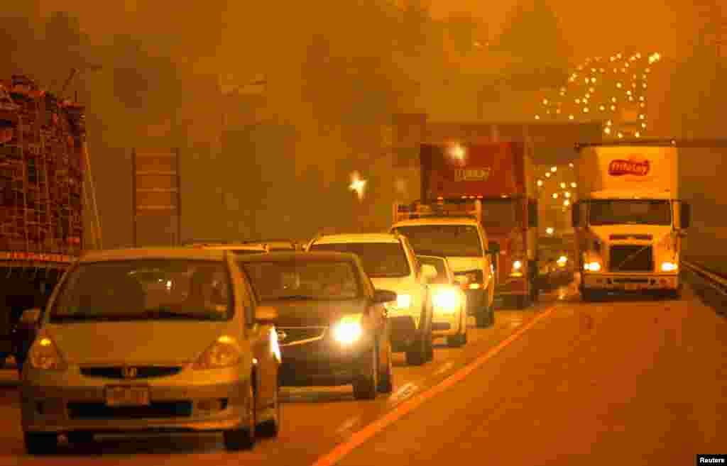 Smoke from the Waldo Canyon fire engulfs a highway in Colorado.