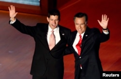 FILE - Republican presidential nominee Mitt Romney, right, and vice presidential running mate Paul Ryan wave after Romney's acceptance speech at the final session of the Republican National Convention in Tampa, Fla., Aug. 30, 2012.