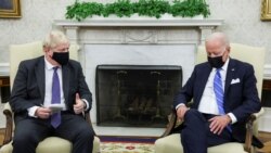美國總統拜登在白宮會見了到訪的英國首相約翰遜(Boris Johnson, 左）（路透社2021年9月21日）