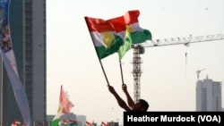 Demonstrators show support for indepence before the referendum vote in Irbil, in the Kurdistan Region of Iraq, Sept. 22, 2017.