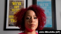 Nikole Hannah-Jones at her home in the Brooklyn borough of New York, Tuesday, July 6, 2021. Hannah-Jones says she will not teach at the University of North Carolina at Chapel Hill following a long fight over tenure. She has accepted a position at Howard University in Washington, D.C. (AP Photo/John Minchillo)