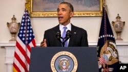 Presiden AS Barack Obama memuji 24 Jam yang bersejarah dalam hubungan Amerika-Iran pada pidato hari Minggu (17/1).