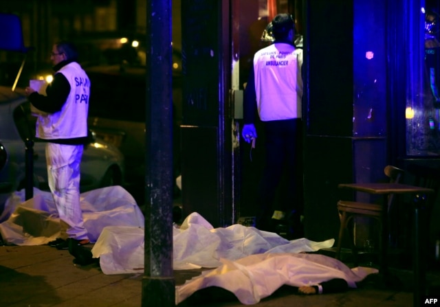 Victims lay on the pavement in a Paris restaurant, Nov. 13, 2015.