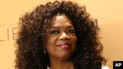 FILE - In this Wednesday, Oct. 14, 2015 file photo, Oprah Winfrey attends the premiere of the Oprah Winfrey Network's (OWN) documentary series "Belief" at The TimesCenter in New York. Weight Watchers is getting another boost from Winfrey. 