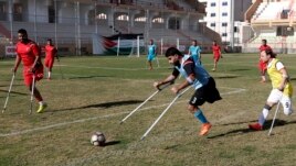 Palestinian amputees play a soccer match while using their crutches during a training session, at Palestine Stadium in Gaza City, Sunday, Dec. 5, 2021. (AP Photo/Adel Hana)