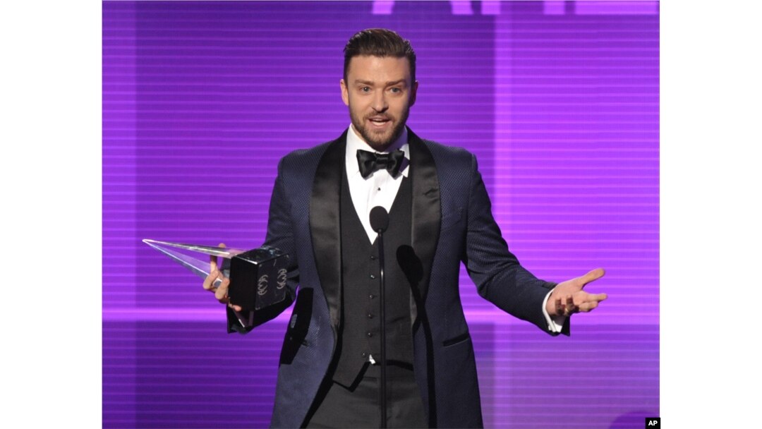 Justin Timberlake accepts the award for favorite male artist - pop/rock at the American Music Awards at the Nokia Theatre L.A. Live on Nov. 24, 2013, in Los Angeles.