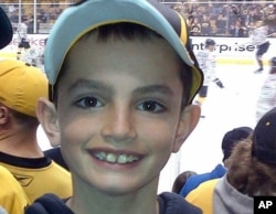 This undated photo provided by Bill Richard shows his son, Martin Richard, who was among the at least three people killed in the explosions at the finish line of the Boston Marathon, Apr. 15, 2013.