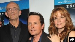 From left, Christopher Lloyd, Michael J. Fox, and Lea Thompson at the Back to the Future 25th Anniversary.