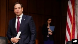 Sen. Marco Rubio, R-Fla., arrives to testify at a Senate Judiciary Committee hearing on Wednesday, March 14, 2018, on Capitol Hill in Washington. (AP Photo/Jacquelyn Martin)