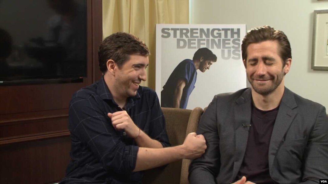 Actor Jake Gyllenhaal with Boston Marathon bombing survivor Jeff Bauman, whom he plays in the movie "Stronger", Sept. 21, 2017. (Photo: P. Poulou / VOA )