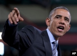 President Barack Obama speaks about immigration reform during visit to Del Sol High School in Las Vegas, Nevada, Nov. 21, 2014.