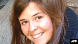 FILE - Kayla Mueller is shown in his undated handout photo obtained courtesy of the Mueller family and the office of U.S. Senator John McCain of Arizona.