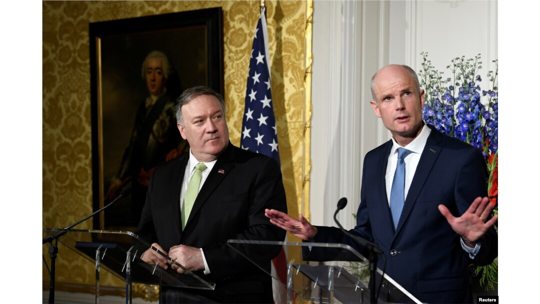U.S. Secretary of State Mike Pompeo looks on as Dutch Foreign Minister Stef Blok gestures during a joint news conference in The Hague, Netherlands, June 3, 2019.