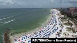 USA, Florida,Sun seekers gather at Clearwater Beach, which remains open despite high numbers of coronavirus disease (COVID-19) infections in the state