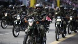 ملائیشیا میں فوج کرونا وائرس کے سبب عائد کردہ پابندیوں پر عمل درآمد کرانے کے لیے گشت شروع کرے گی۔